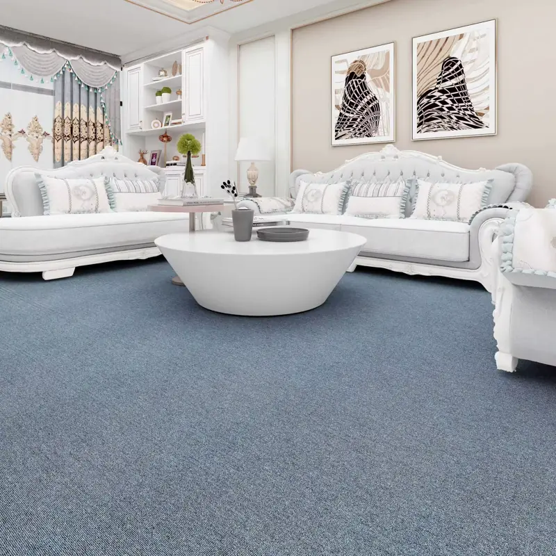 Blue wall-to-wall carpet in white living room